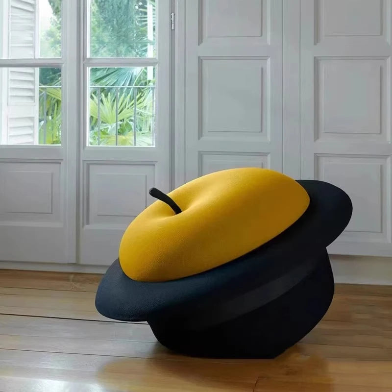 Black Hat & Apple Ottoman | plush furniture